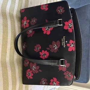Kate spade black/ dark purple purse. Gently used. No wearing on corners.